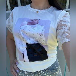 New with tags white graphic T-shirt. Stretch material. Cotton material.